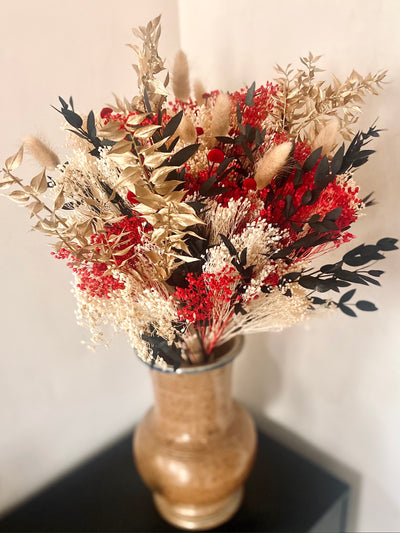Bouquet Festif aux jolies couleurs de Noël pour apporter une touche originale à votre décoration. 